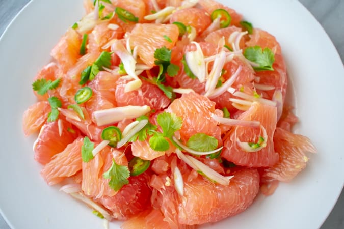 pomelo salad on a white plate