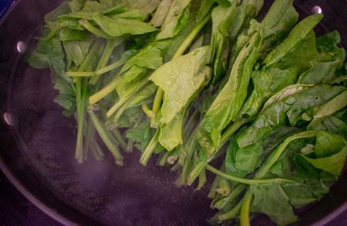 spinach in boiling pot