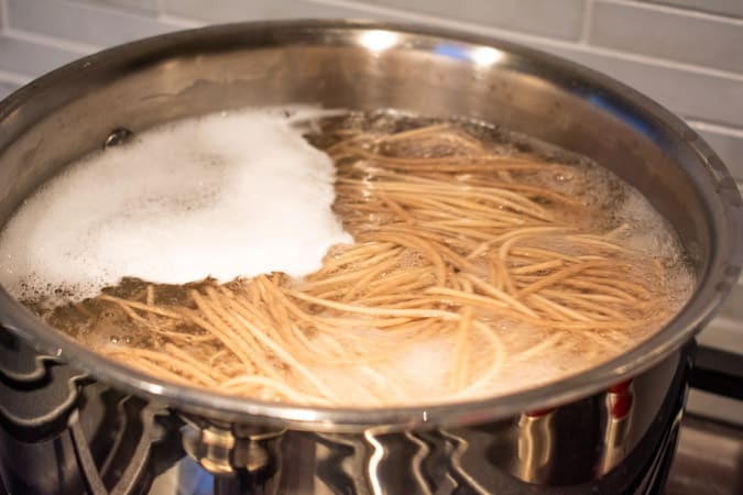 soba noodles cooking in pot