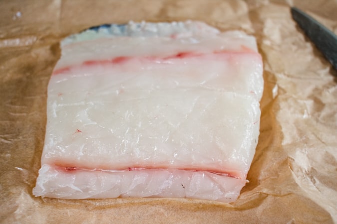1 pound fillet of halibut on brown butcher paper