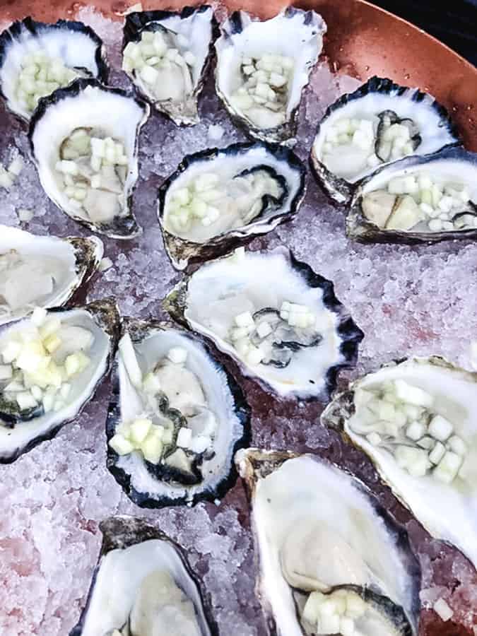 Oysters on the half shell with apple mignonette