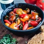 black Bowl of marinated asian tomato salad