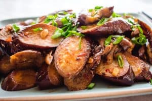 Chinese sichuan eggplant with green onion garnish