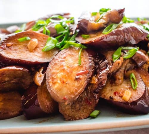 Chinese sichuan eggplant with green onion garnish