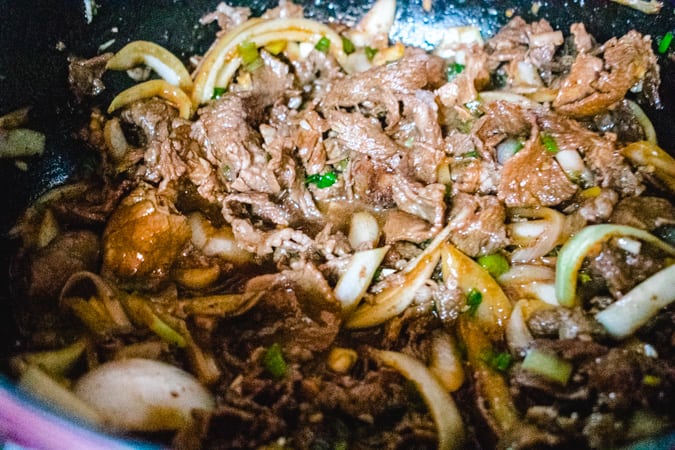 korean bbq beef with onion in a pan