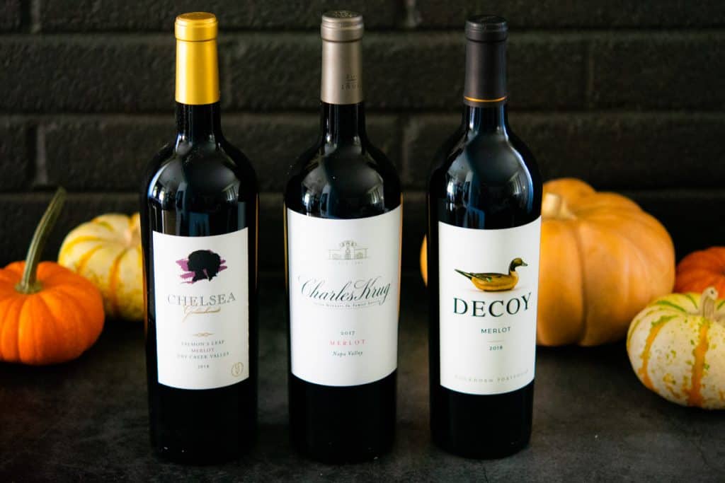 3 merlot wines with pumpkins in the background