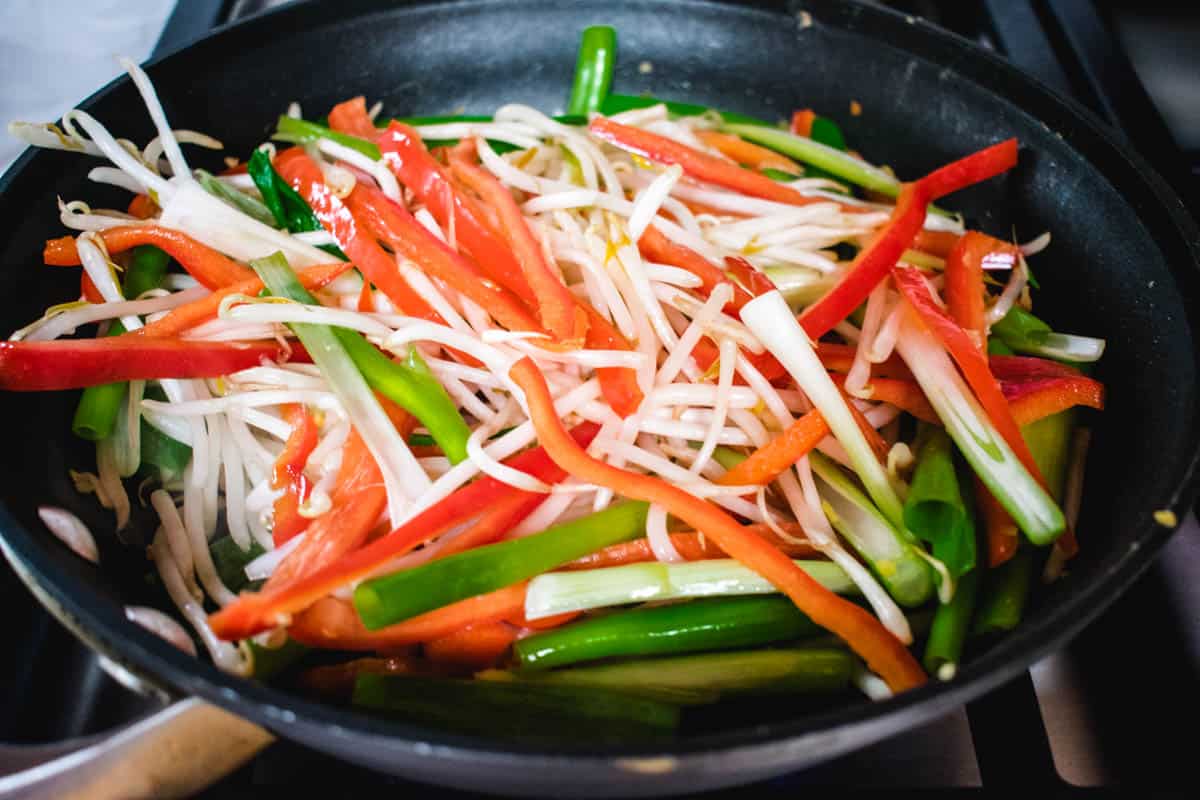 vegetables cooking in a nonstick pan