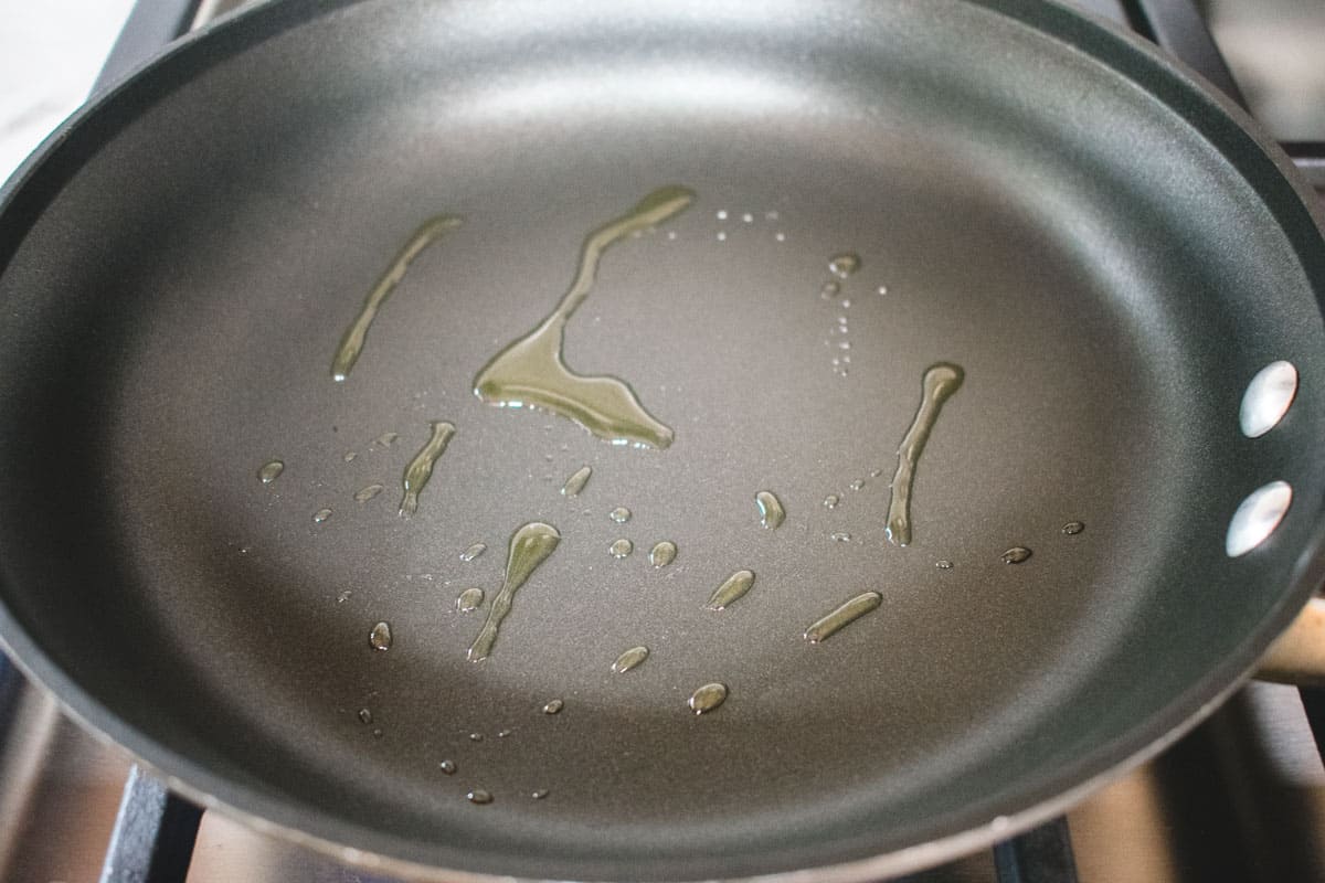 oil squirted over a nonstick pan