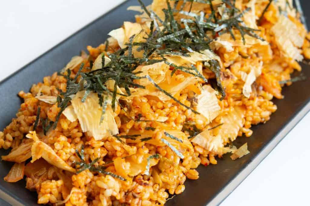 tuna kimchi fried rice on a rectangular black plate - 4