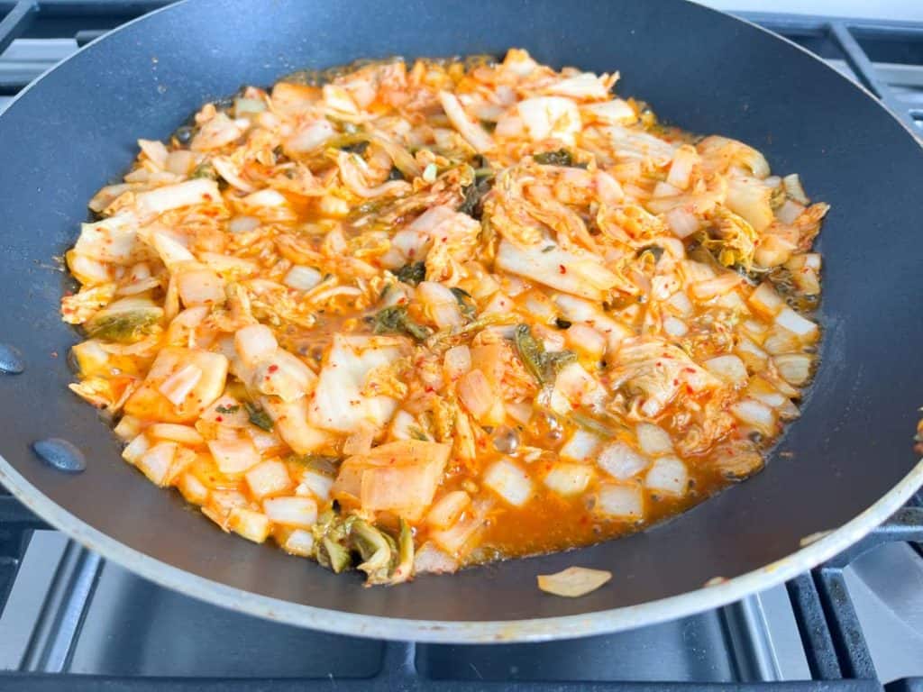 kimchi with water in a nonstick skillet
