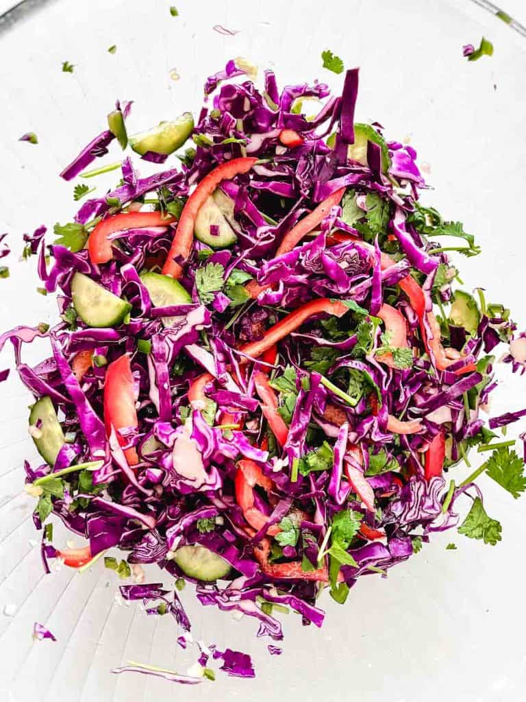 vegetables in a bowl for mango salmon salad