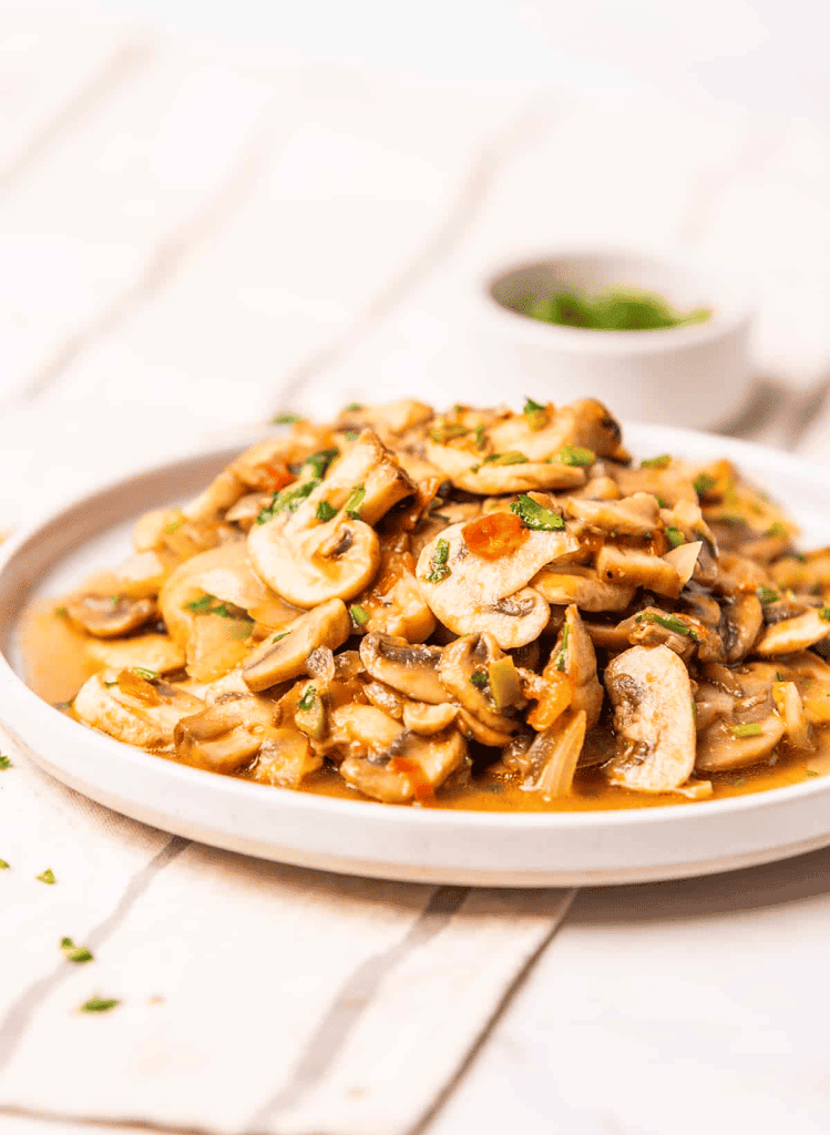 Mexican mushrooms on a white round plate