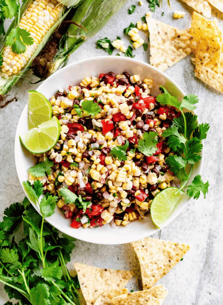 Corn and black bean salsa on a white round plate