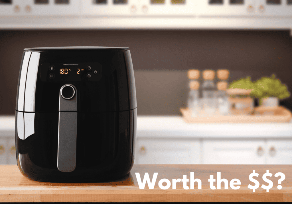 black air fryer on a kitchen countertop with the words "worth the $$?"