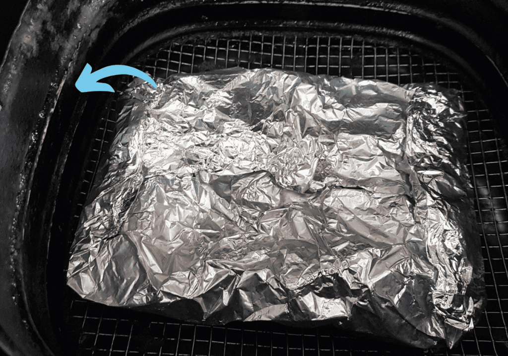 foil packet in an air fryer with deteriorated nonstick basket