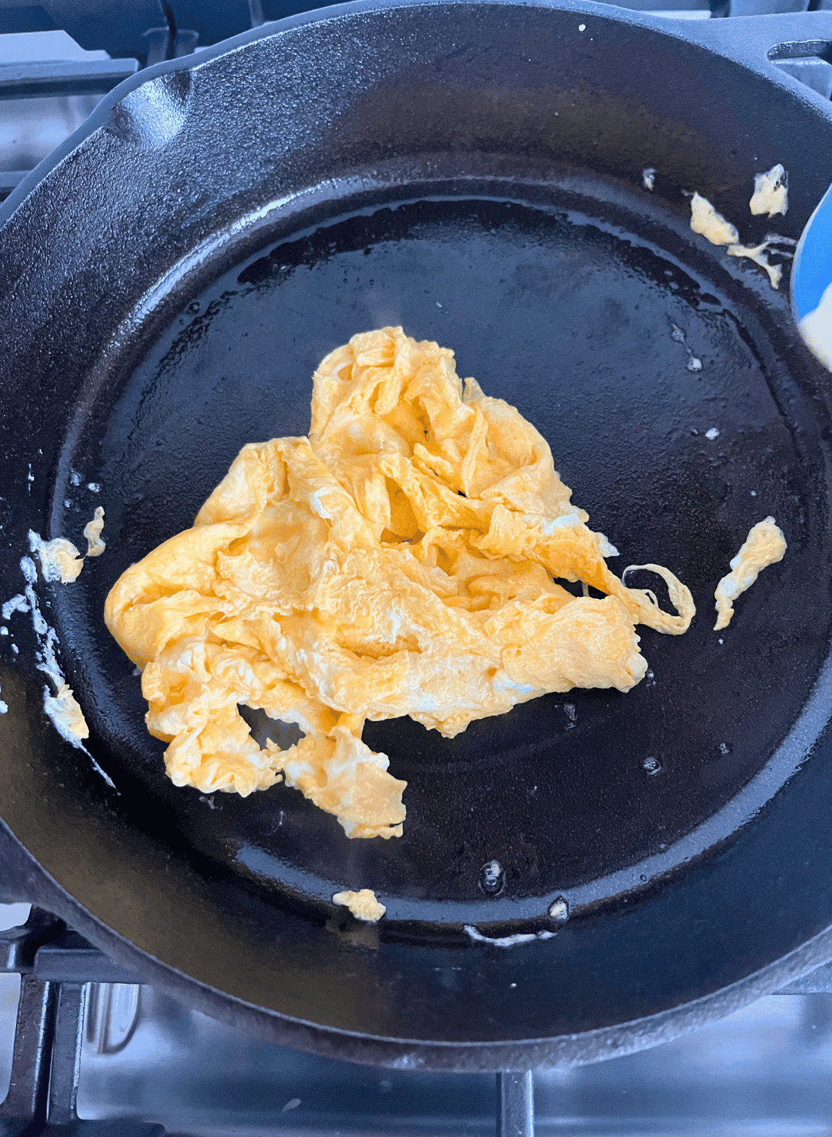 scrambled egg in a cast iron pan