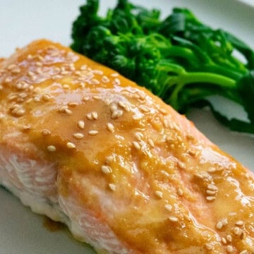 Glazed king salmon with sesame seeds and a side of broccolini