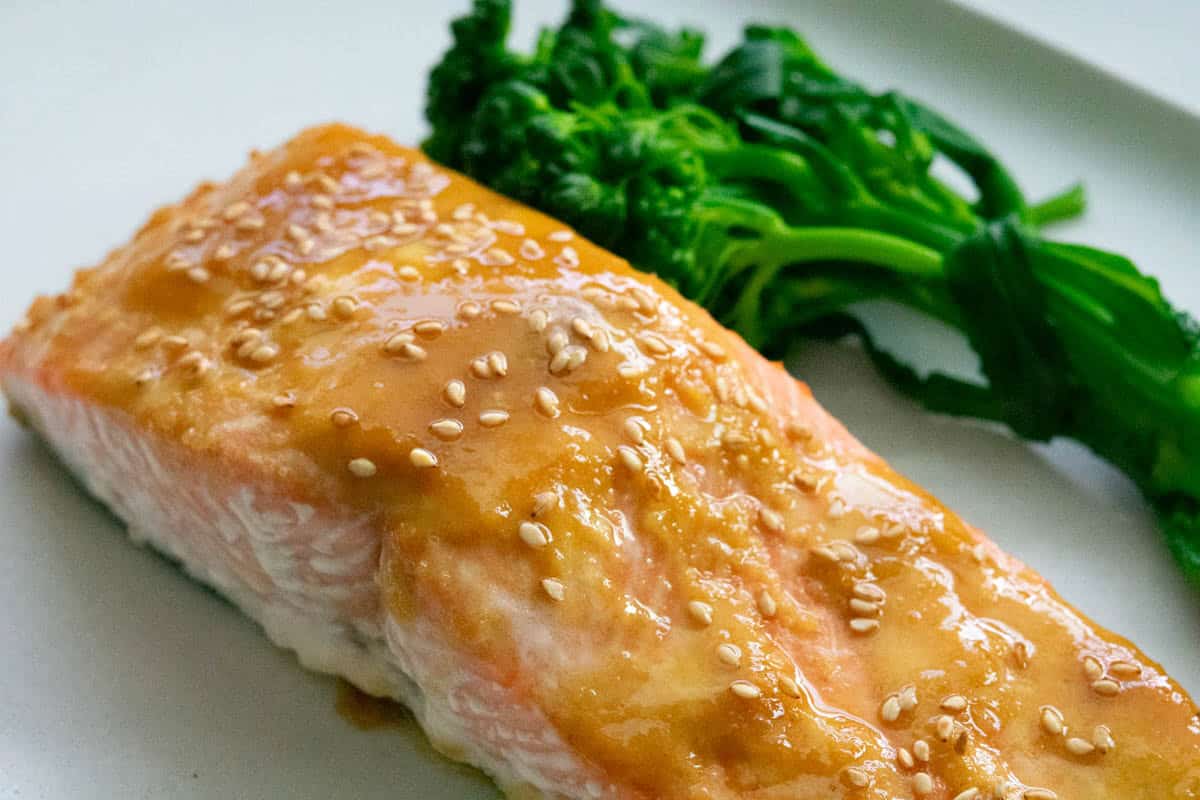 Glazed king salmon with sesame seeds and a side of broccolini