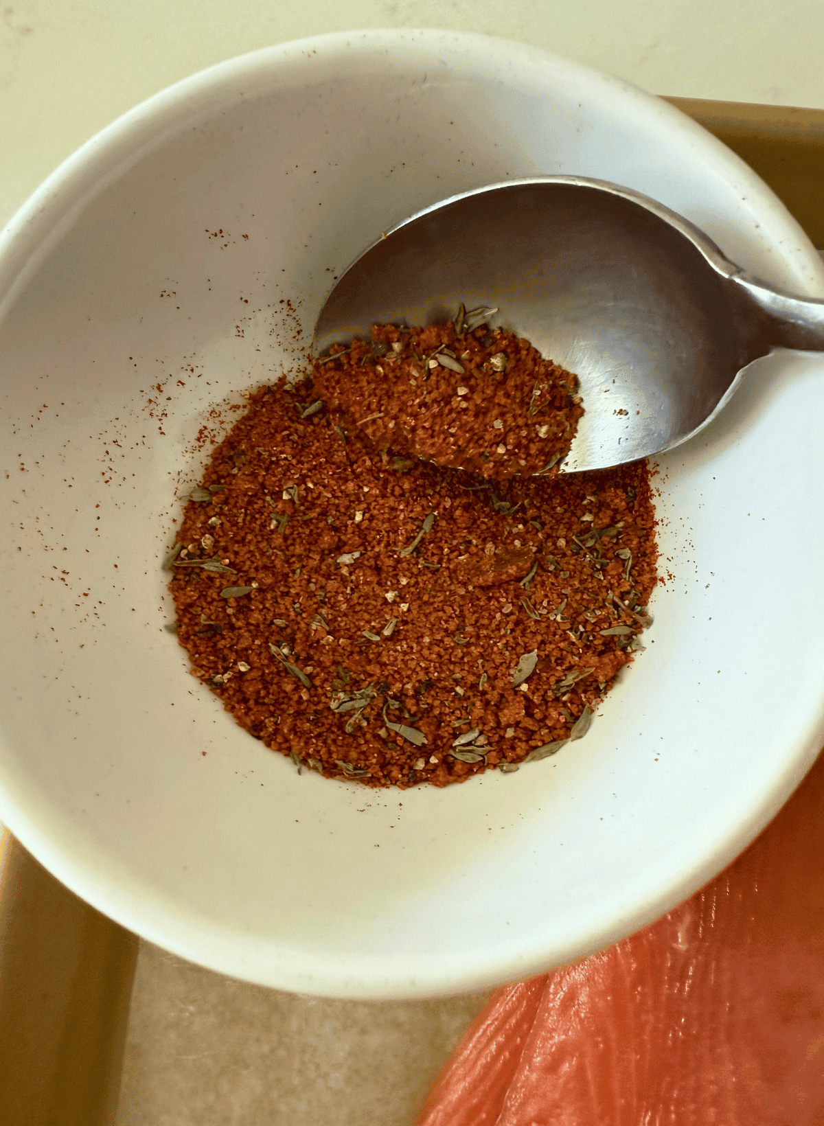 spoon stirring homemade trader joe's salmon rub